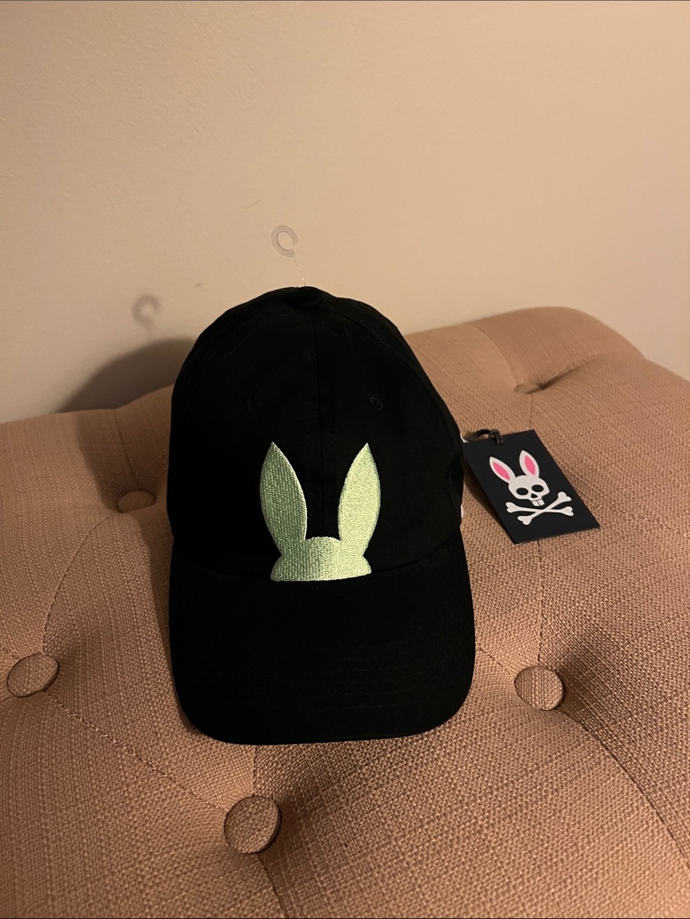 Psycho Bunny Unisex black ball cap with neon green bunny